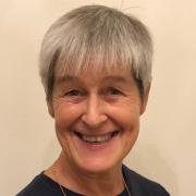 photo of Alison Radevsky - head and shoulders, Alison smiling at camera